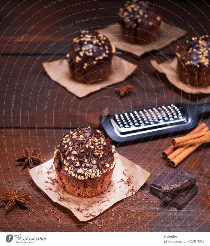 chocolate muffin Dessert Nutrition Table Paper Wood Fresh Delicious Above Brown Muffin cooking background Bakery cake Cupcake eat fat food Gourmet Home-made