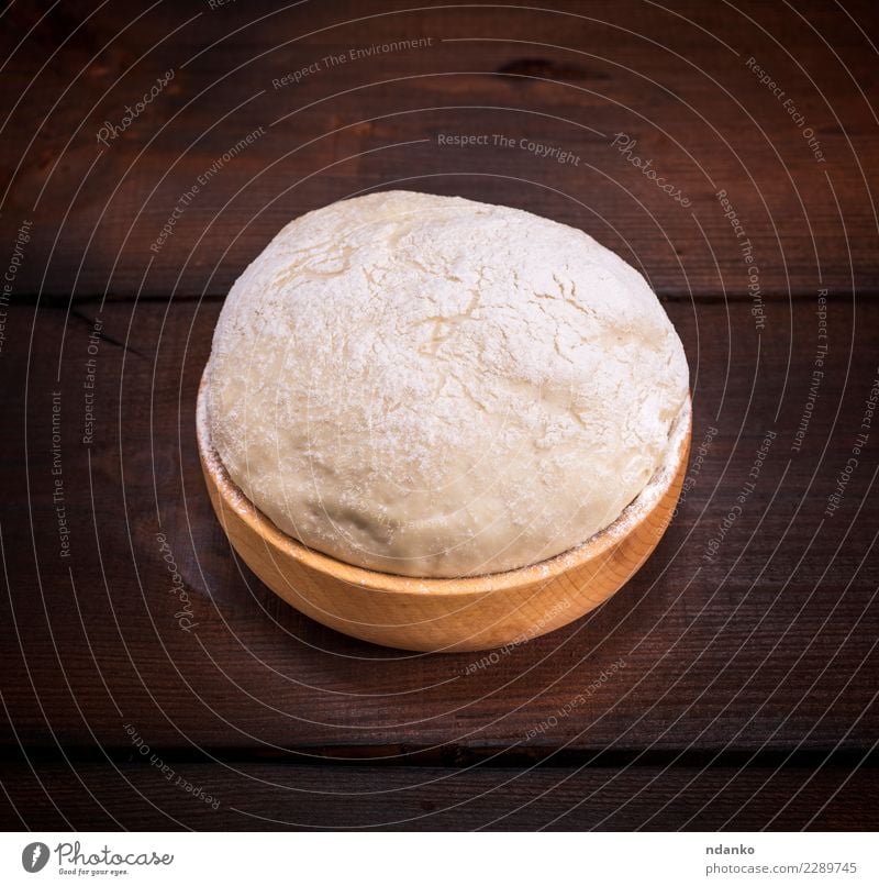 yeast dough made from white wheat flour Dough Baked goods Bread Bowl Table Kitchen Wood Eating Fresh Natural Above Brown White Yeast background Preparation food