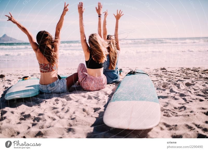 Happy millennial friends cheering on the beach Lifestyle Joy Leisure and hobbies Vacation & Travel Freedom Summer Summer vacation Sun Beach Ocean Feminine