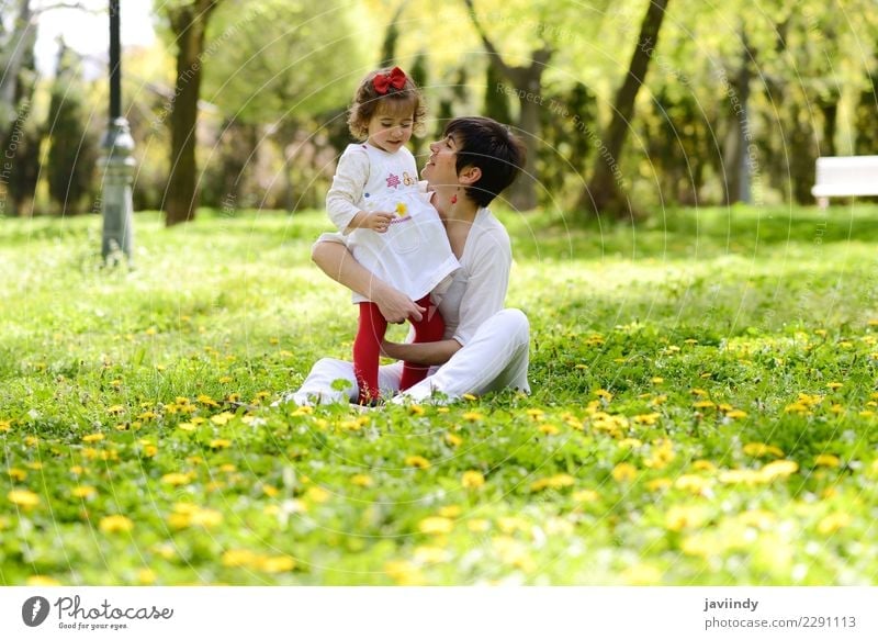 mother and little girl playing in the park Lifestyle Joy Leisure and hobbies Child Human being Feminine Baby Woman Adults Mother Family & Relations Couple
