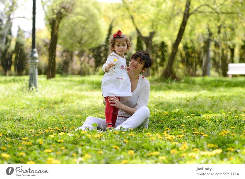 mother and little girl playing in the park Lifestyle Joy Child Human being Feminine Baby Girl Young woman Youth (Young adults) Woman Adults Mother