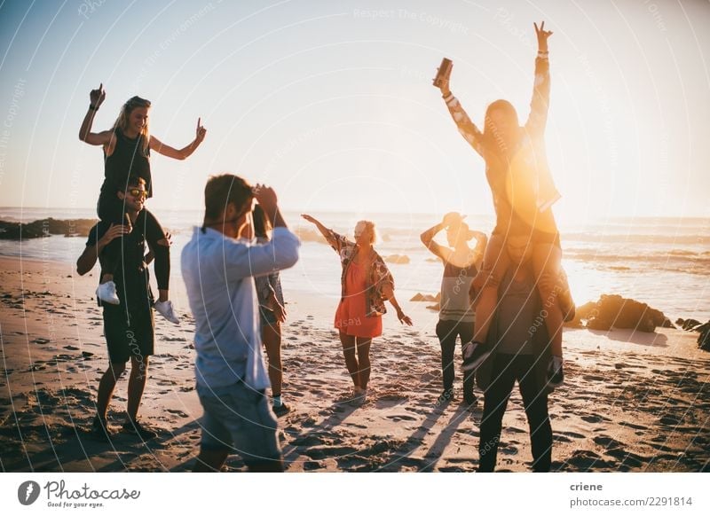 Group of happy friends dancing on beach party Lifestyle Vacation & Travel Adventure Summer Summer vacation Sun Beach Ocean Music Human being Friendship