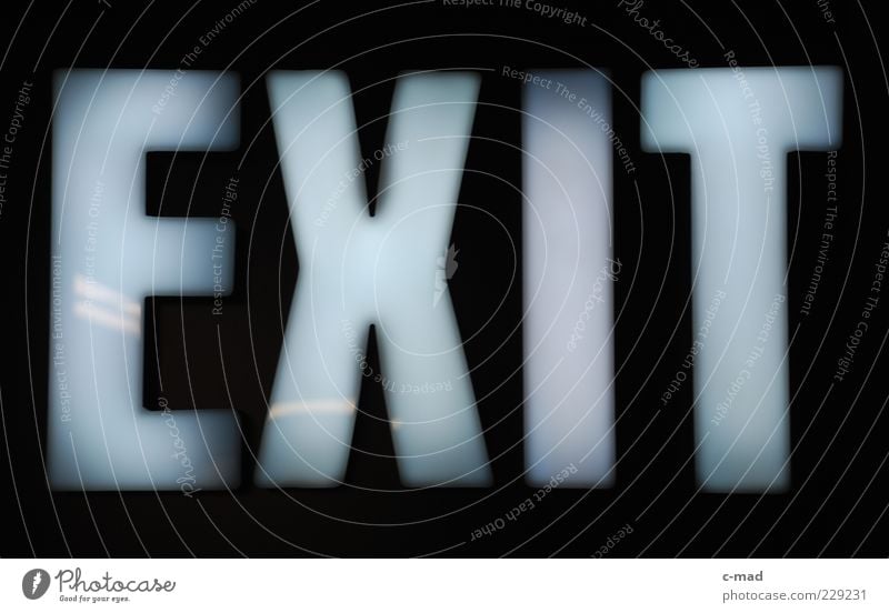 exit Signs and labeling Glass Plastic Characters Signage Warning sign Colour photo Interior shot Close-up Detail Deserted Neutral Background Artificial light