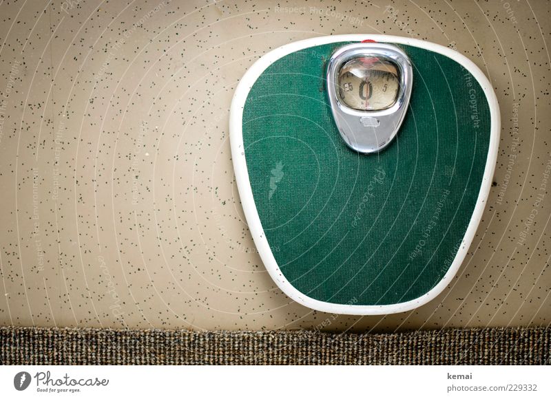 The zero is Overweight Scale Carpet Edge Floor covering Old Green Weigh bathroom scales Seventies Retro Weight problems Colour photo Interior shot Day Light