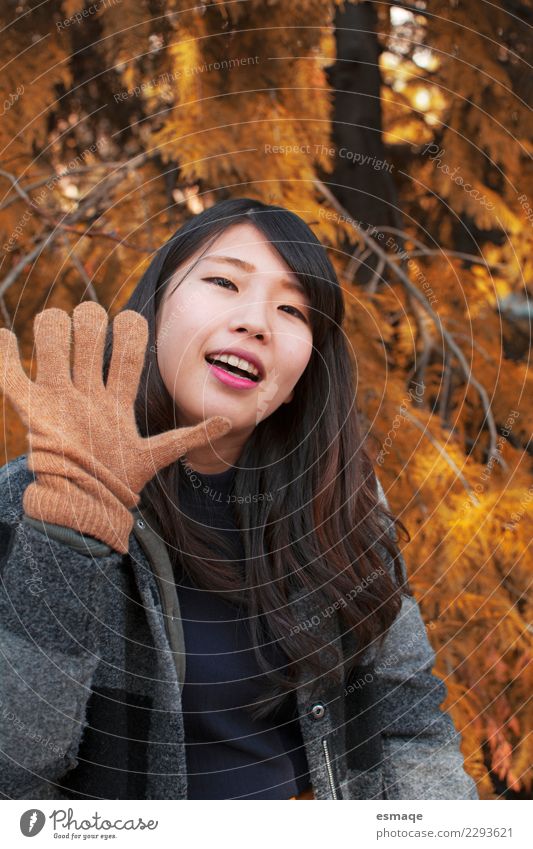 Asian Young woman smiling with gloves in autumn Lifestyle Joy Beautiful Health care Wellness Vacation & Travel Tourism Adventure Human being Feminine
