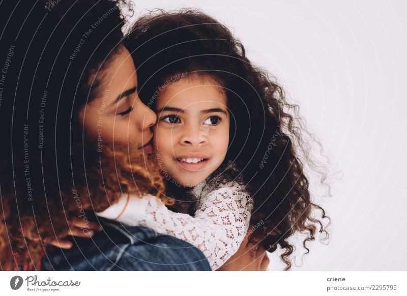 African american mother giving daughter a kiss on cheek Happy Beautiful Child Woman Adults Mother Family & Relations Infancy Afro Kissing Smiling Love Happiness