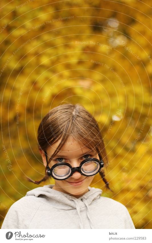 golden child girl Infancy Head Face 8 - 13 years Child Autumn smile Study Uniqueness Smart Joy Happiness Diligent Reading glasses Intellectual schuler Education