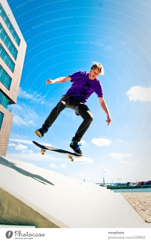 BS Flip Lifestyle Leisure and hobbies Jump Skateboarding Sun Blue sky Wide angle Multicoloured Exterior shot Copy Space top Copy Space bottom Day Sunlight