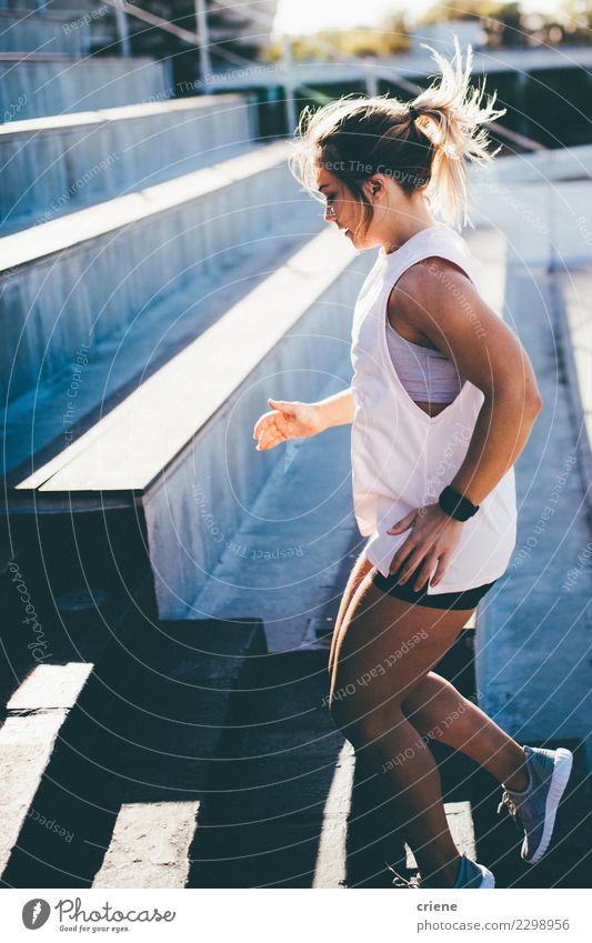 Fit caucasian Woman doing stair sprint exercise Lifestyle Relaxation Sports Climbing Mountaineering Jogging Human being Adults Man Stairs Footwear Fitness