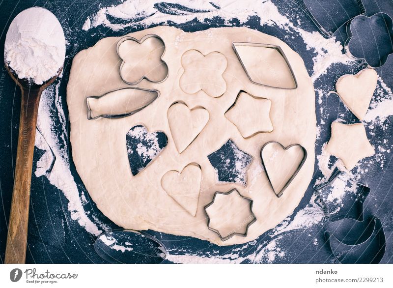 cutting out cookies from dough Dough Baked goods Candy Spoon Table Kitchen Heart Fresh Above Black White star Top Home-made background food Flour board Raw