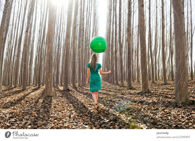 Young woman in poplar forest with green dress and balloon Lifestyle Joy Beautiful Relaxation Human being Youth (Young adults) Woman Adults 1 18 - 30 years