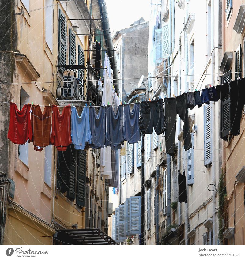 Washing day sorted on the line Style Living or residing Old town Town house (City: Block of flats) Facade Shutter T-shirt Pants Hang Authentic Historic Tall