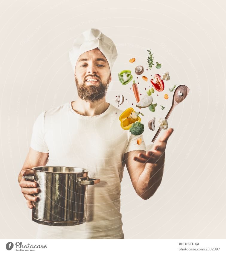 Funny cook juggles with pot, spoon and vegetables Food Vegetable Nutrition Style Joy Party Event Restaurant Human being Young man Youth (Young adults) Man