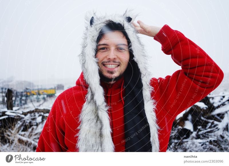 Happy man in a snowy day Lifestyle Style Joy Wellness Harmonious Well-being Vacation & Travel Winter Snow Winter vacation Human being Masculine Man Adults 1