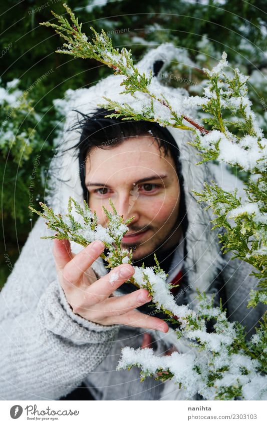 Young man enjoying the snow Lifestyle Style Joy Human being Masculine Man Adults Youth (Young adults) 1 30 - 45 years Environment Nature Winter Climate Weather