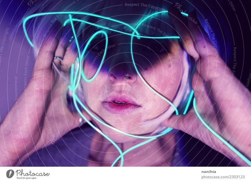 Abstract portrait of a young woman holding neon lights Lifestyle Design Exotic Make-up Senses Night life Entertainment Party Event Feasts & Celebrations