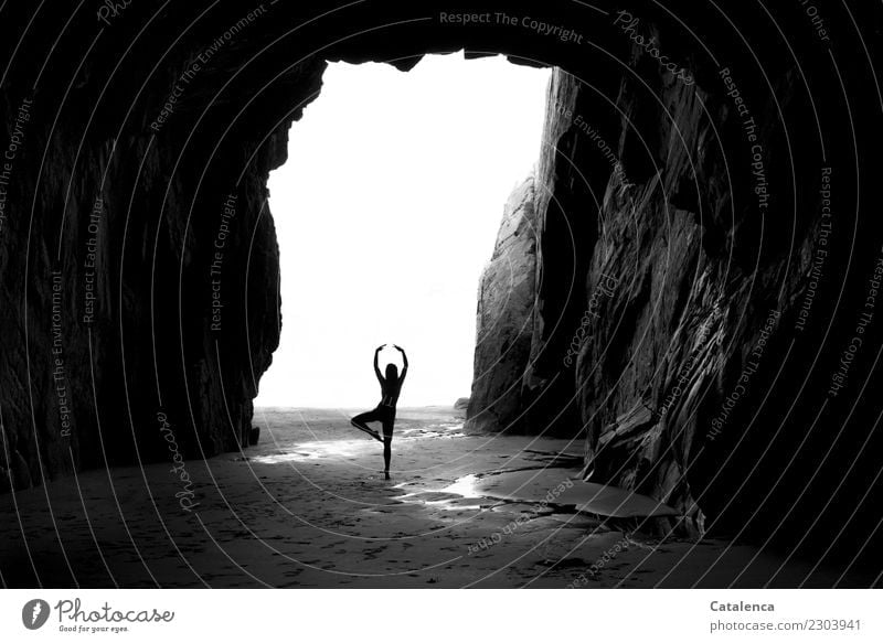 Dancing mood, In the cave on the beach the young woman dances Feminine 1 Human being Landscape Water Summer Beautiful weather Rock coast Beach Ocean Cave