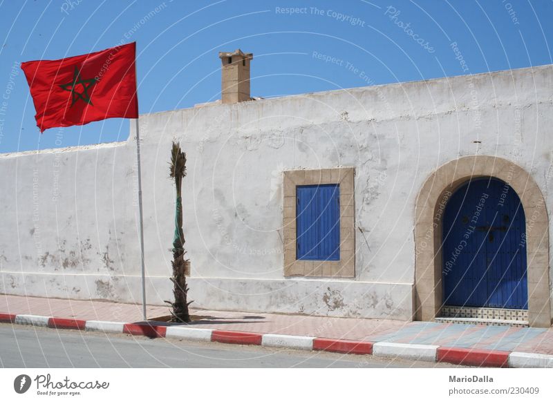 Morocco Cloudless sky Sunlight Wind Building Authentic Strong Blue Red Power Might Pride Energy Identity Calm Colour photo Exterior shot Star (Symbol)