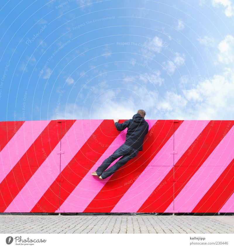 Looking to the future Human being Masculine Man Adults 1 Hang Pink Red Fence Barrier Climbing Curiosity Stripe Line Direction Sky Clouds Vantage point