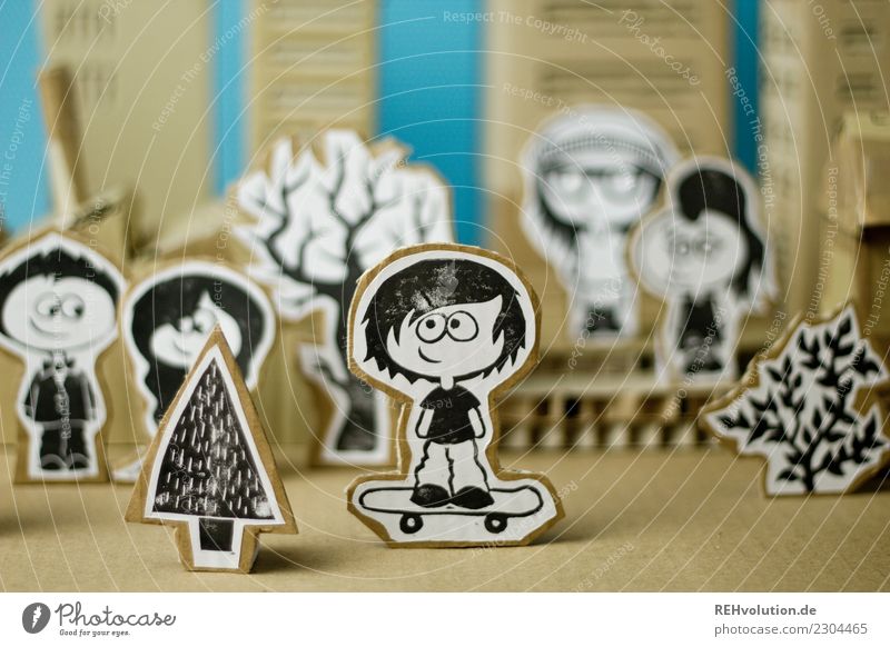 Pappland - boy on a skateboard in the city Skateboard Sociology Difference Uniqueness Comic strip character Figure Home-made Idea Cardboard Creativity