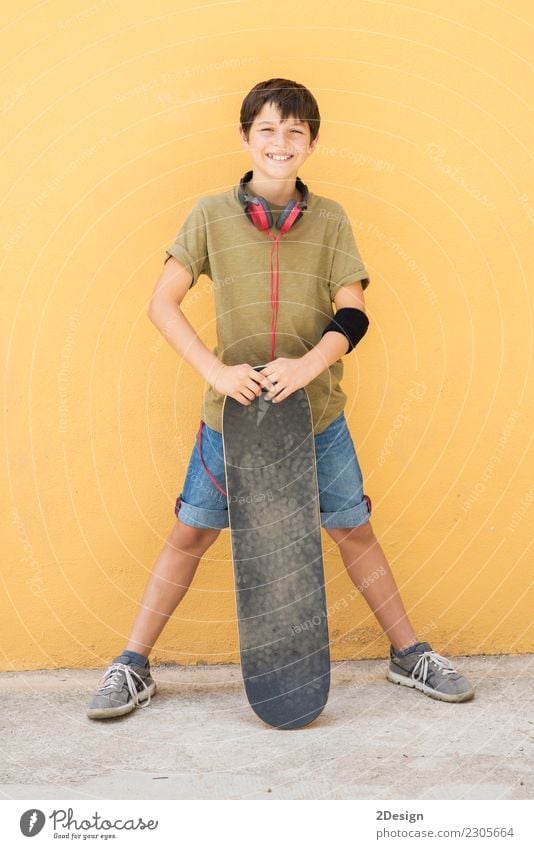 A Teen with skateboard on the city street Lifestyle Style Joy Happy Sports Schoolchild Human being Boy (child) Man Adults Infancy Street Fashion Jeans Smiling