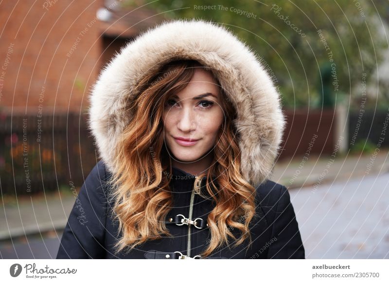 young woman in winter jacket Lifestyle Winter Human being Feminine Young woman Youth (Young adults) Woman Adults 1 18 - 30 years Autumn Weather Bad weather Town