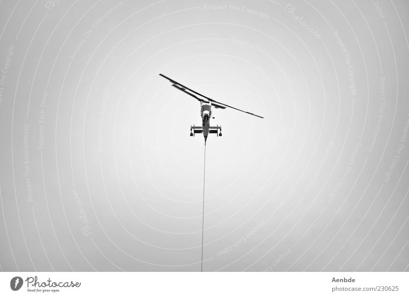 you&me Cable Aviation Sky Means of transport Helicopter Rescue helicopter Hang Carrying Throw Aggression Exceptional Black Silver White Willpower Effort