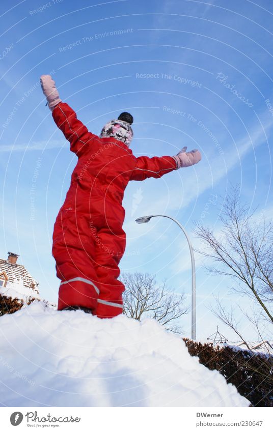 snow king Well-being Contentment Playing Adventure Winter Snow Child 1 Human being Sky Clothing Gloves Cap Stand Romp Happiness Bright Red Optimism Movement