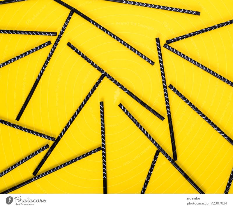 black cocktail straws Tube Plastic Bright Above Soft Yellow Black Colour coctail background party drink circle Colour photo Close-up Detail
