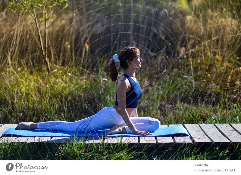 Young woman doing yoga in nature. Lifestyle Beautiful Body Relaxation Meditation Summer Sports Yoga Human being Youth (Young adults) Woman Adults 1