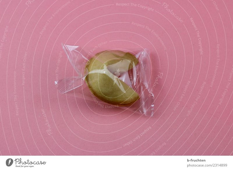 Fortune cookie in plastic bag Candy Pink Surprise Success Packaging Sheath Asia Curiosity Idea Colour photo Interior shot Studio shot Deserted Downward