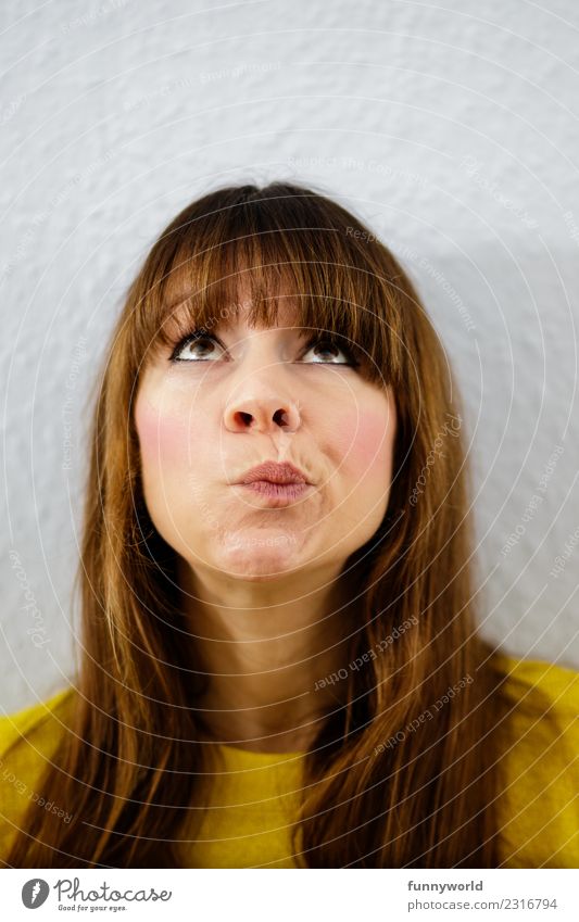 Woman looks up Human being Adults 1 Think Emotions Self Control Mistrust Stupid Decide Above Select Bangs Brunette Long-haired Sweater Yellow Exasperated Future