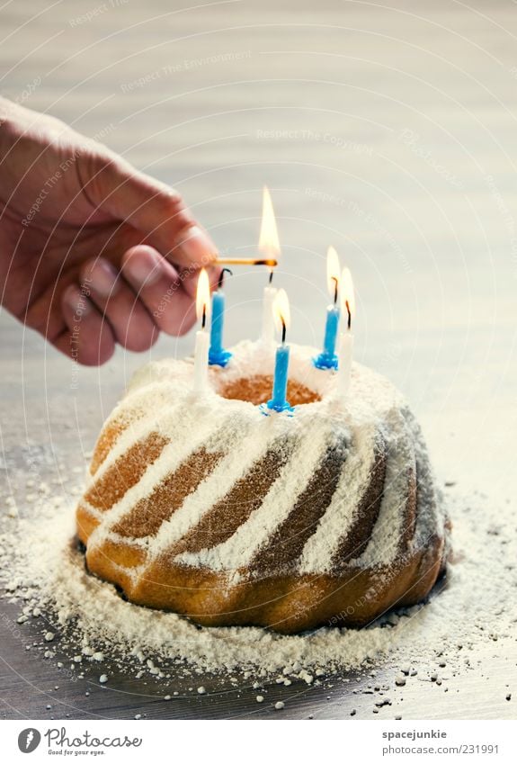 birthday cake Masculine Hand Fingers Anticipation Cake Birthday Candle Candlelight Ignite Feasts & Celebrations Delicious Nutrition Food photograph Sweet