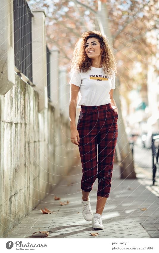 Young woman curly hairstyle with casual clothes in the street Lifestyle Style Beautiful Hair and hairstyles Face Human being Feminine Youth (Young adults) Woman