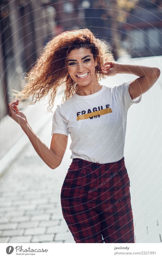 Happy young woman smiling in urban background Lifestyle Style Joy Beautiful Hair and hairstyles Face Human being Feminine Young woman Youth (Young adults) Woman
