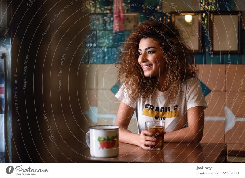 Smiling woman in a bar with vintage decoration Beverage Drinking Lifestyle Style Joy Happy Beautiful Hair and hairstyles Leisure and hobbies Restaurant