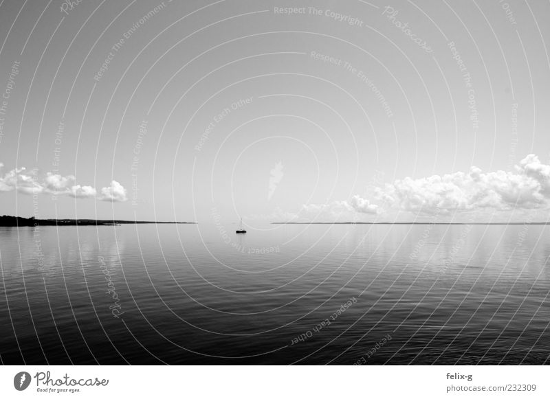 horizonless Water Sky Horizon Coast Ocean Navigation Yacht Sailboat Gray Calm Wanderlust Loneliness Eternity Stagnating Infinity Time Black & white photo