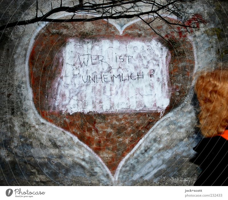 who's scary? Woman Adults Hair and hairstyles Human being Kreuzberg Wall (barrier) Red-haired Curl Sign Graffiti Heart Think Cold Curiosity Interest Mysterious