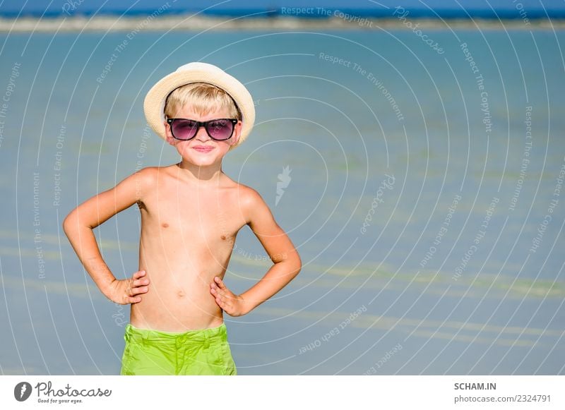 Portrait of a handsome boy at the sunny beach Lifestyle Joy Playing Summer Ocean Island Human being Masculine Child Infancy 1 3 - 8 years Landscape Beach
