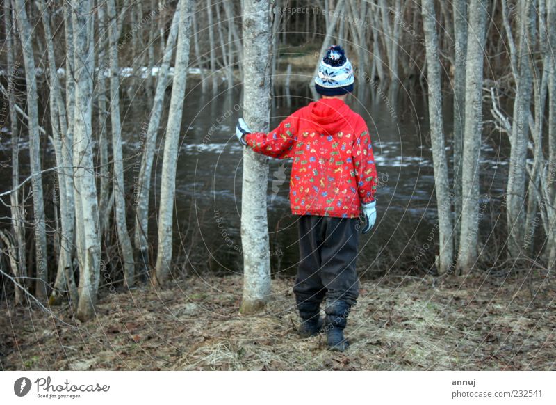 Let me stay here Child 1 Human being 8 - 13 years Infancy Nature Water Tree Wild plant River Discover To enjoy Listening Looking Stand Simple Curiosity Gray Red