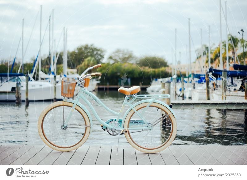 Bicycle on the dock Wheels Cruiser Sailboat Harbour Dock Vacation & Travel Summer Sky Clouds Basket Pedal Wood Water Ocean Lake Tree Tourism Multicoloured Ride