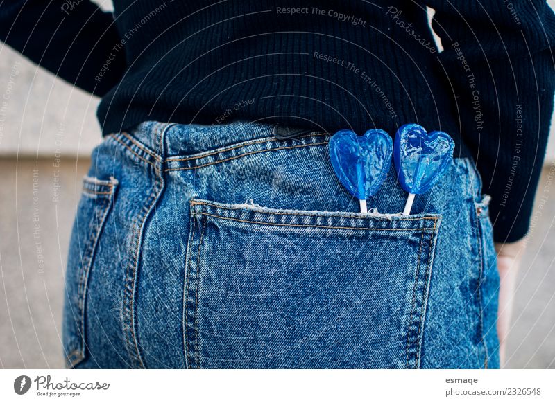 Jeans with blue Lollipop Sugar Candy Lifestyle Joy Healthy Overweight Allergy Valentine's Day Girl Young woman Youth (Young adults) Fashion Clothing Pants Blue