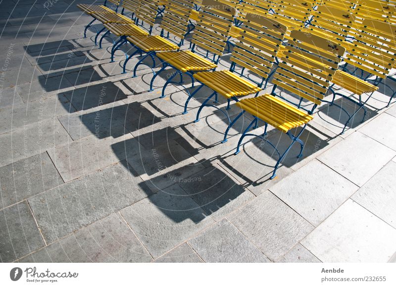 there are still places available... Event Stone Esthetic Blue Yellow Chair Colour photo Exterior shot Deserted Morning High-key Bird's-eye view Row of chairs