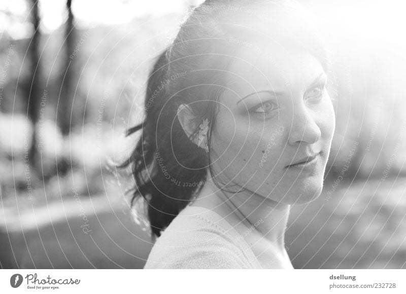 Young woman looking away in the evening light Feminine Youth (Young adults) 1 Human being 18 - 30 years Adults Sunlight Looking Black & white photo