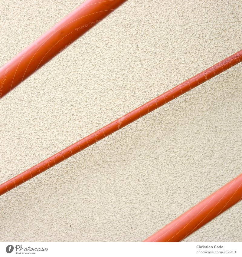 Red tubes Pipe Iron-pipe Banister Wall (barrier) Wall (building) Diagonal Parallel Exterior shot Abstract Structures and shapes Deserted Copy Space left
