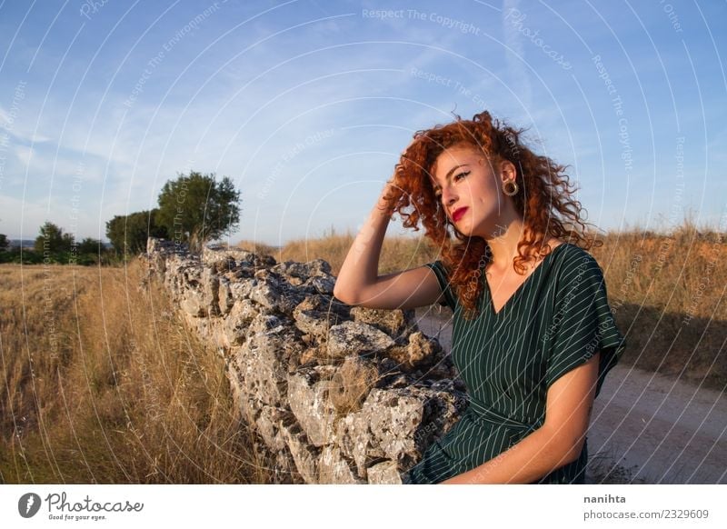 Young redhead woman enjoying the sunset outdoors Lifestyle Elegant Style Beautiful Hair and hairstyles Wellness Harmonious Senses Relaxation Vacation & Travel