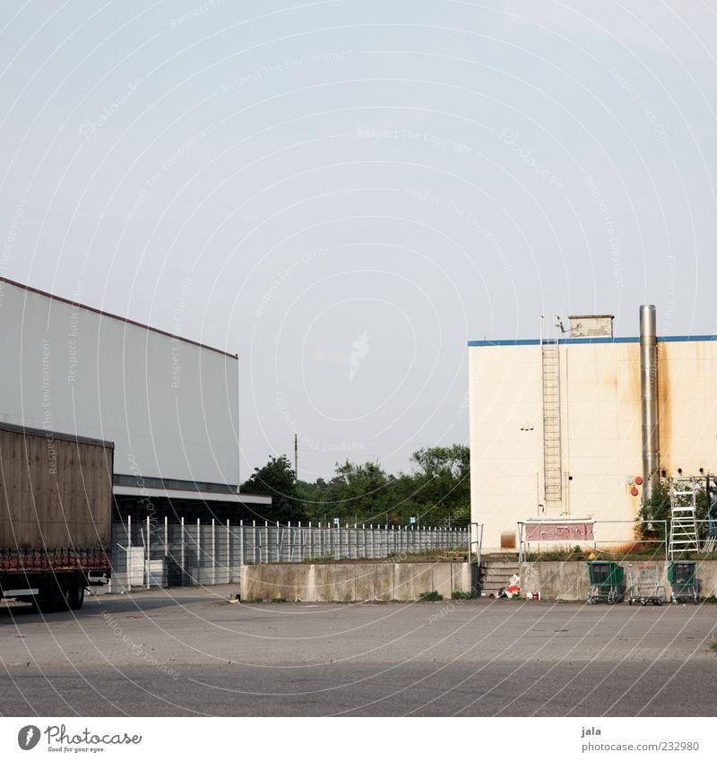transshipment centre Sky Cloudless sky Industrial plant Factory Places Manmade structures Building Architecture Truck Gloomy Colour photo Exterior shot Deserted