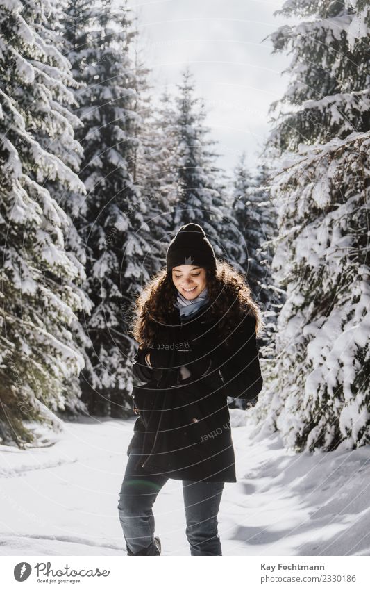 Young woman trudges through winter forest Joy Happy Wellness Life Harmonious Well-being Contentment Vacation & Travel Tourism Trip Far-off places Freedom Winter