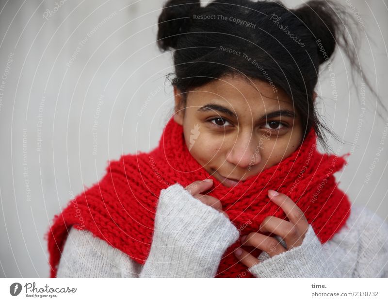 Samina Feminine Woman Adults 1 Human being Wall (barrier) Wall (building) Sweater Scarf Hair and hairstyles Brunette Long-haired Afro Observe To hold on Smiling