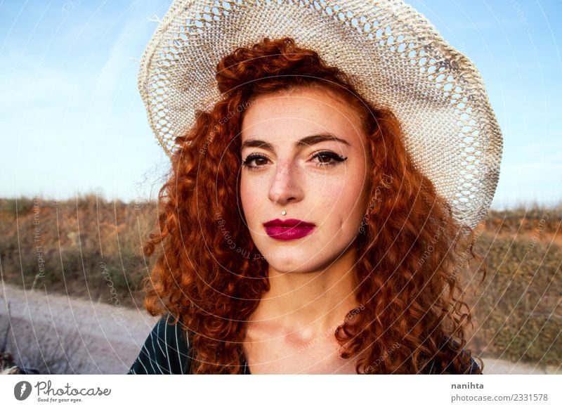 Young redhead woman wearing a wheat hat Lifestyle Elegant Beautiful Hair and hairstyles Skin Face Freckles Vacation & Travel Tourism Summer Summer vacation Sun